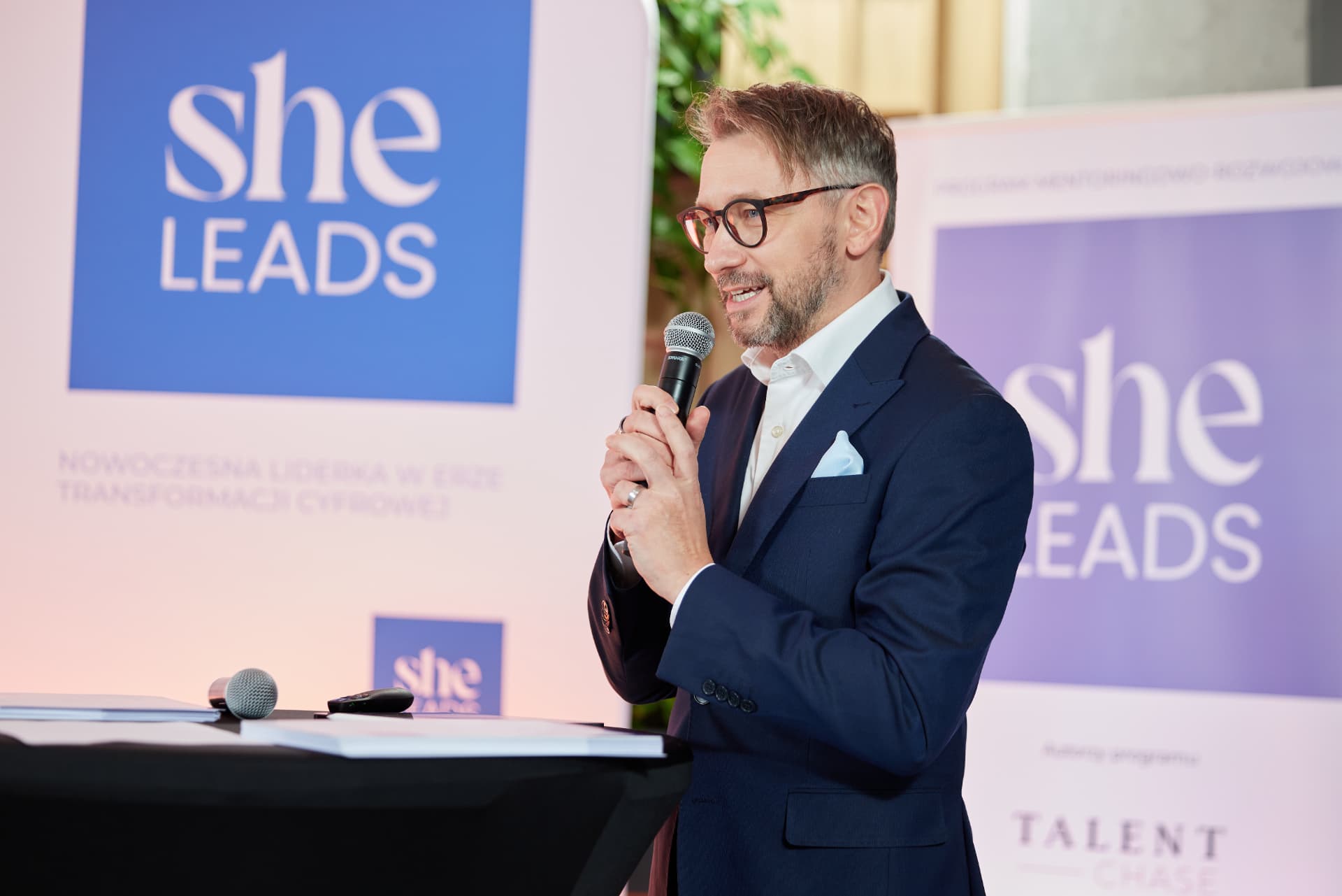 Andrew Wrobel delivering a keynote at She Leads Poland in Warsaw