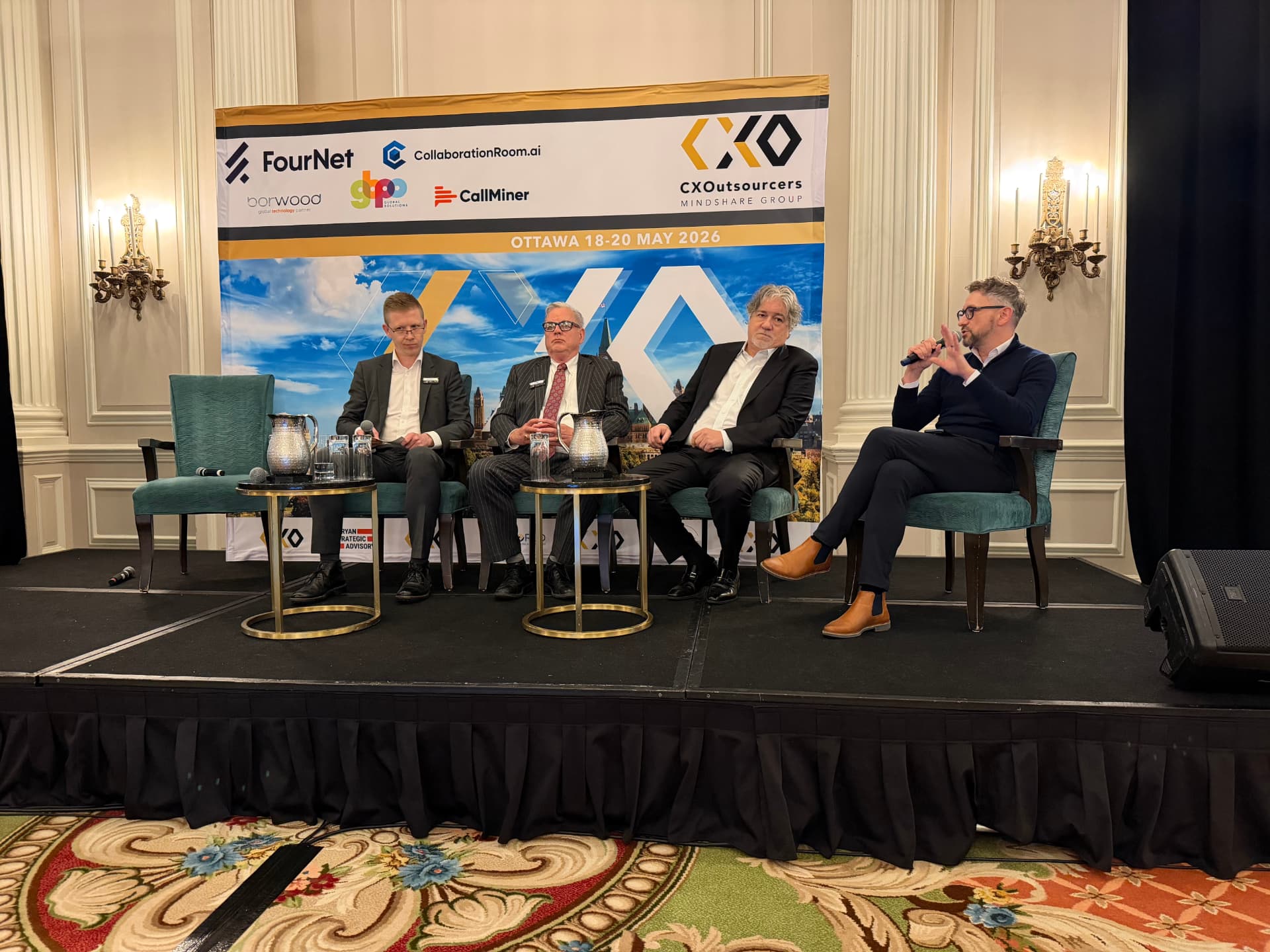 Andrew Wrobel speaking on a panel at the CXOutsourcers Mindshare in Ottawa